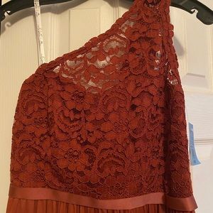 David’s Bridal. Size 8. Cinnamon color one shoulder lace dress